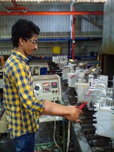 Action image: An engineer testing equipment